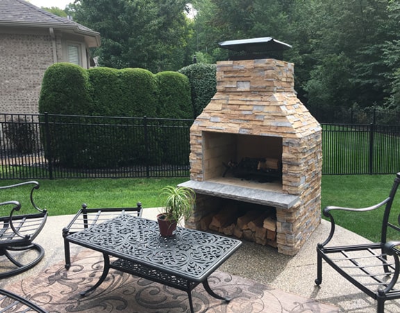 36" Patio Series fireplace in man-made veneer with custom base and hearth.